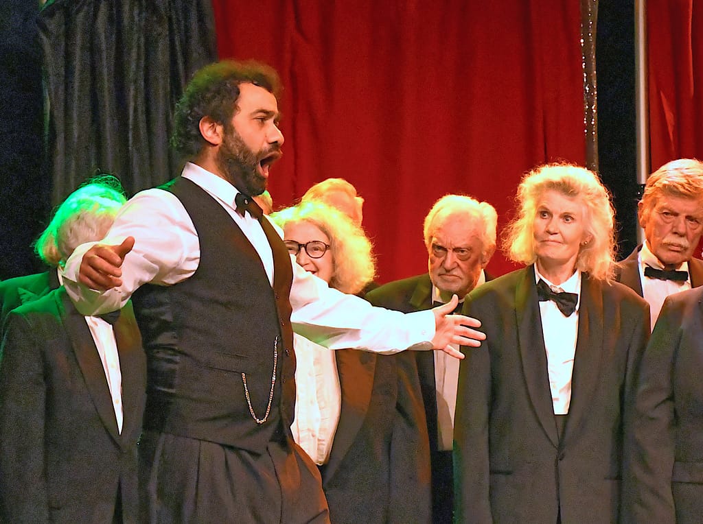 Dr Spiridion and chorus